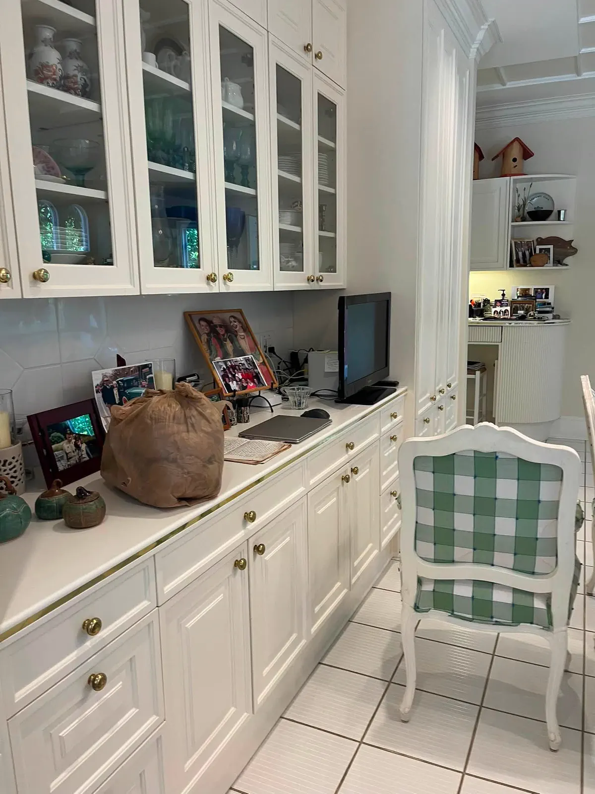 Finished white built-in cabinetry with clean painted surfaces