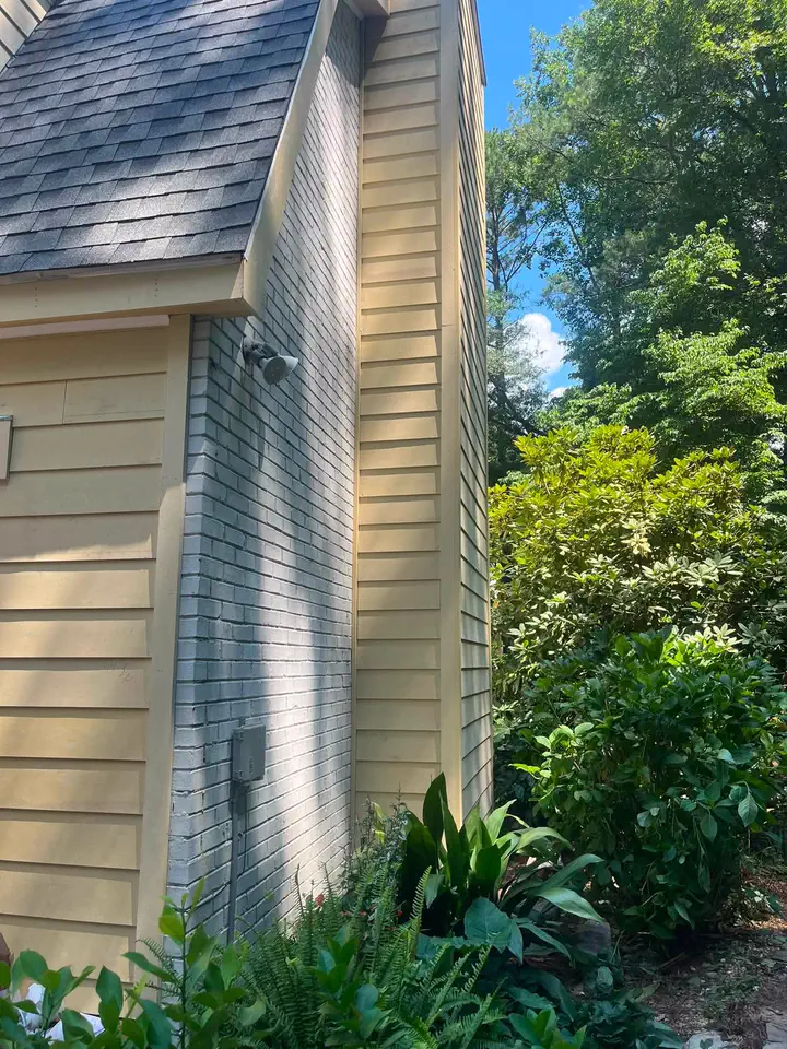 Close side view of the yellow exterior before repainting